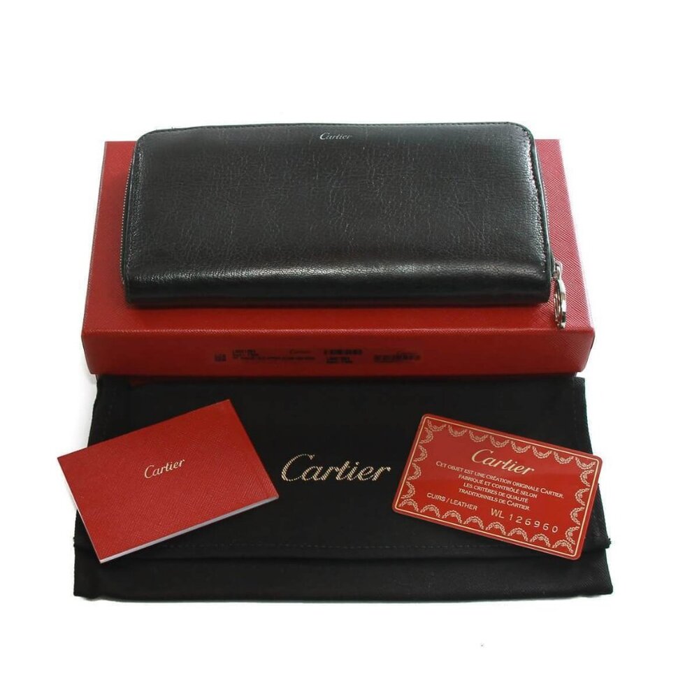 Authentic Must De Cartier black zippy wallet